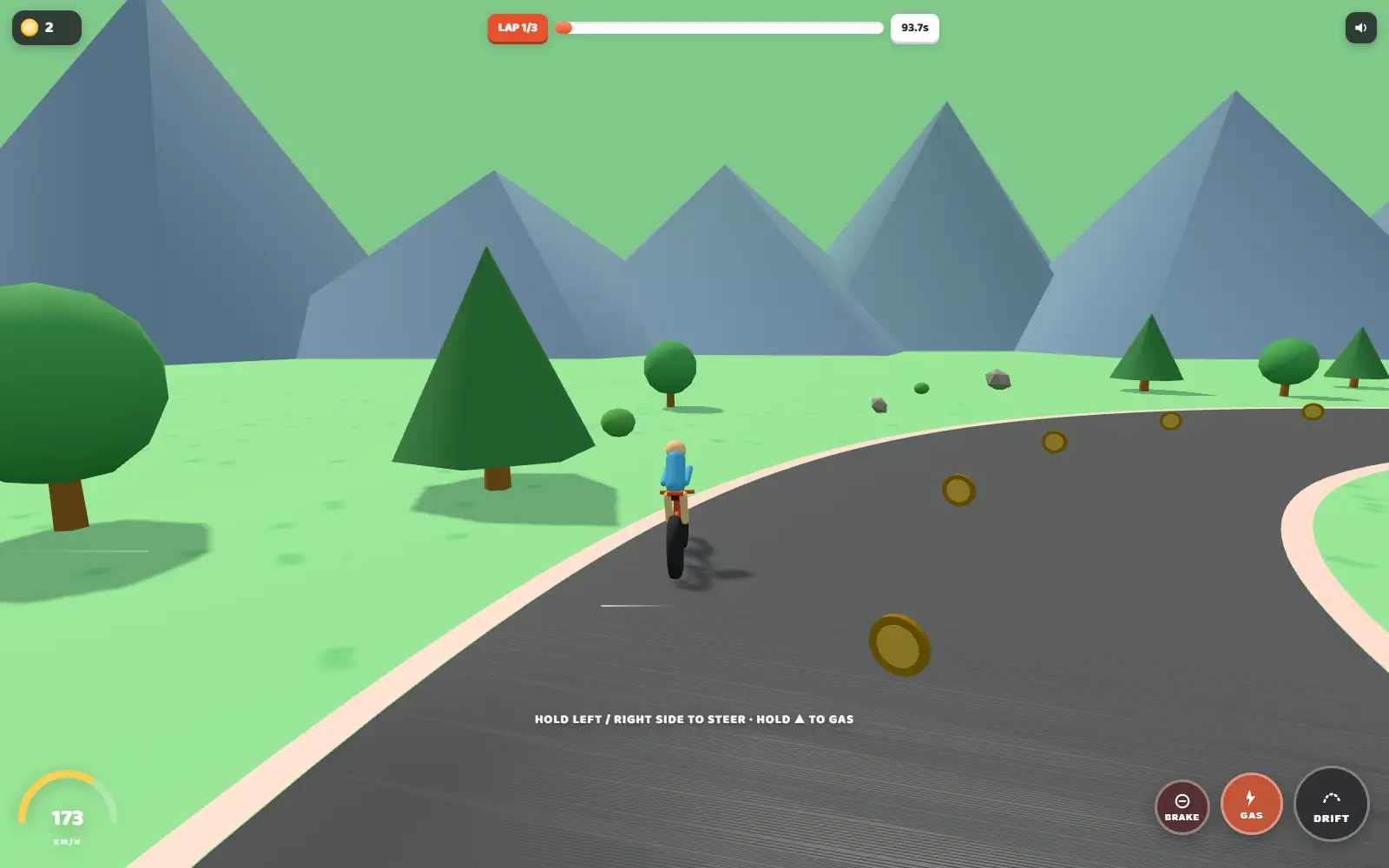 A rider on an empty grey road through green hills, coins strung along the tarmac ahead.